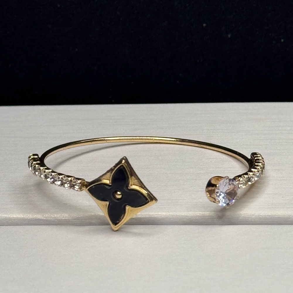 NWOT Gold Tone Sparkling Black Clover Open Cuff Bracelet